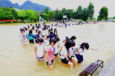 Students prepare for college entrance exam in flood-hit Guangxi
