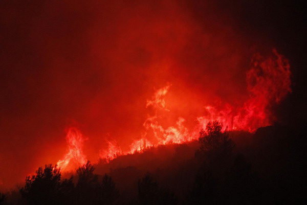 Wildfire rages in southern France