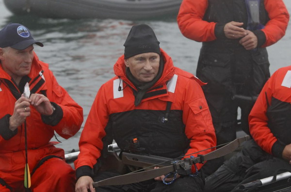 Russia's Putin braves rough seas to study whales