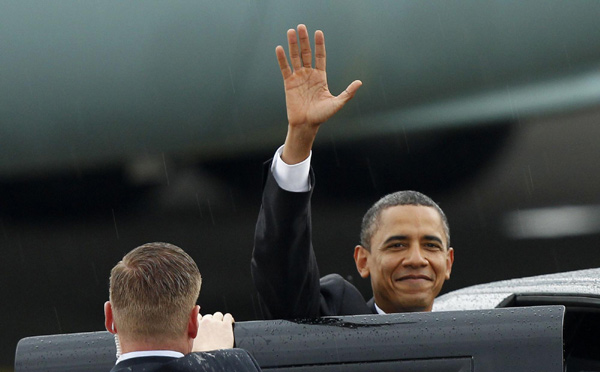 Obama warms Indonesia ties; volcano may cut trip