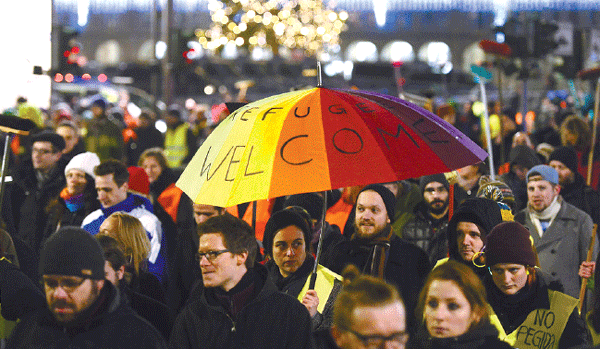 Anti-Muslim protesters rally despite Merkel plea