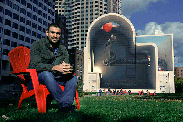 Iranian Artist Mehdi Ghadyanloo Sits In Front Of His Mural