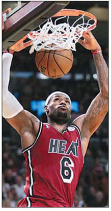 James scores 31, Bosh adds 23 as Heat beat Bobcats