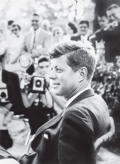 Rare JFK photos on display at Newseum