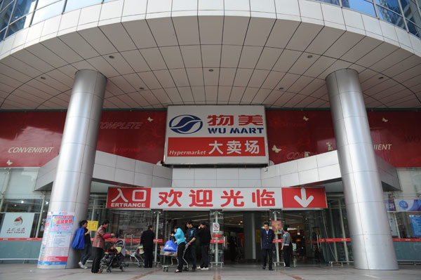 Wumart bags Lotus outlets