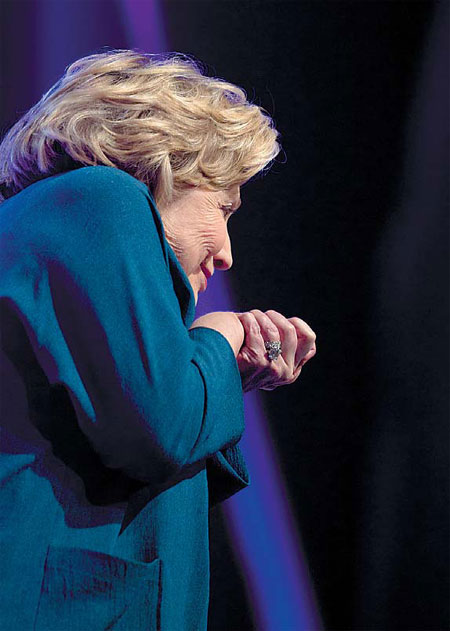 Hurled shoe misses Clinton at Vegas speech