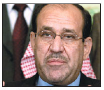 Iraq's Maliki steps down, backs rival