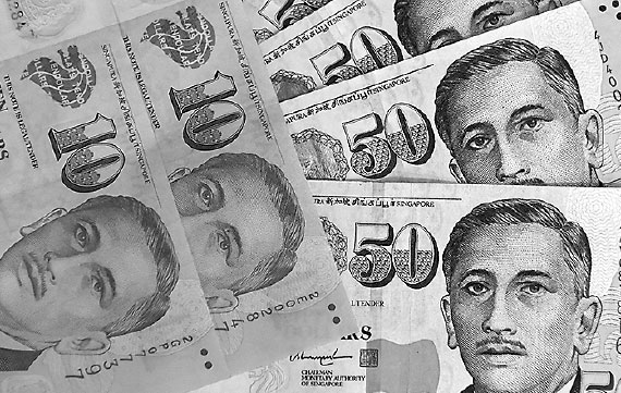 Singapore dollar dips on easing