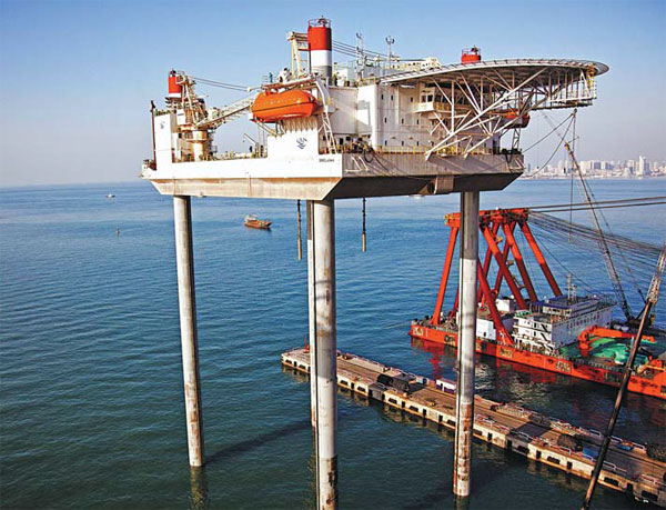 Oil, gas firms face 'tough balancing act'