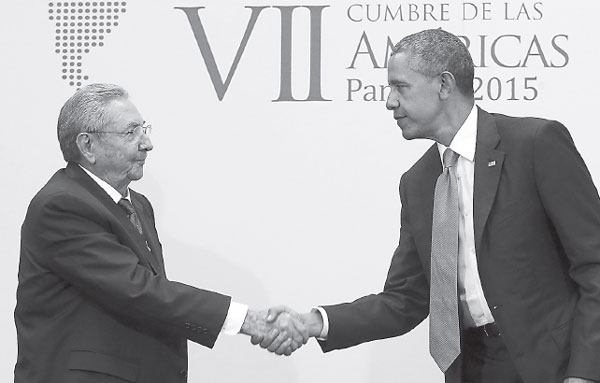 Us President Barack Obama Shakes Hands With Cuba S President Raul