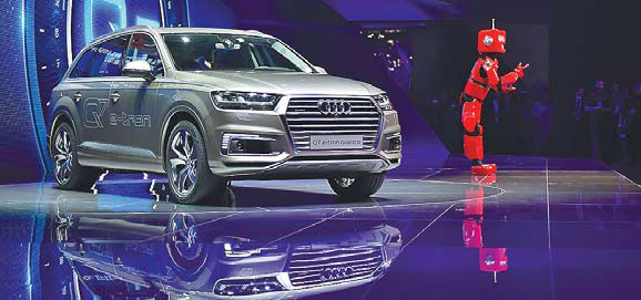An Audi Q7 E Tron Car Is Unveiled During A Presentation At
