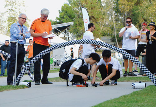 Rubber band-car racing excites