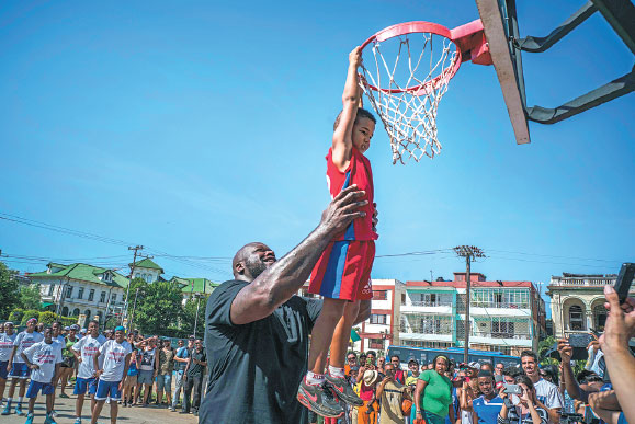 Shaq slam dunks basketball diplomacy