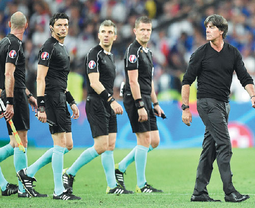 germany coach joachim loew leaves the pitch ahead of the