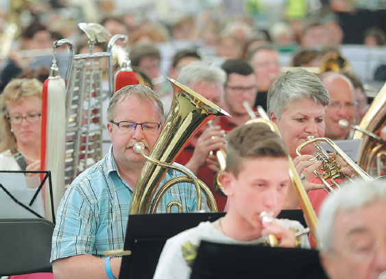 The Horn Section Plays A Tune During A Session Of The