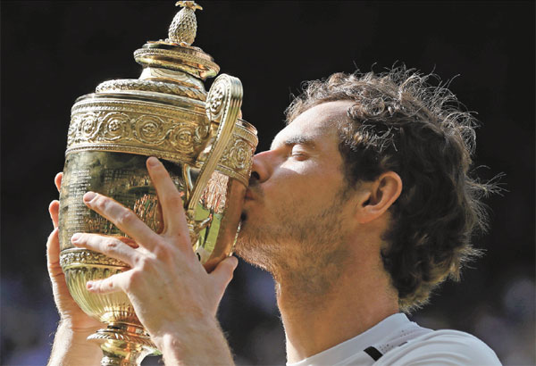 Scotland S Andy Murray Kisses The Trophy After Beating