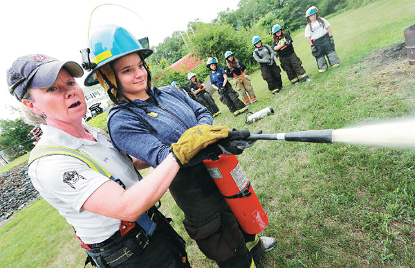 Lieutenant Lyn Moraghan Left Instructs Tara Sivak In The