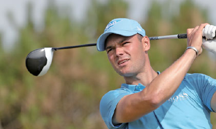 martin kaymer of germany tracks his tee shot off no 13 in the first