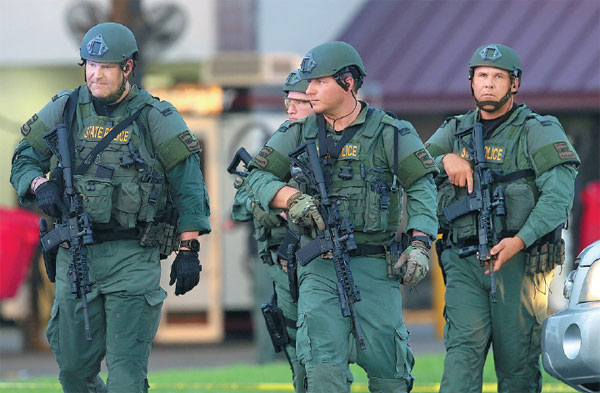 Louisiana State Police Officers Leave The Location Where