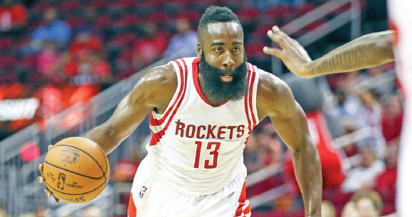 Houston Rockets Guard James Harden Dribbles The Ball During The First