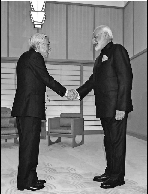 Indian Prime Minister Narendra Modi Right Shakes Hands With Japan S Emperor Akihito During A