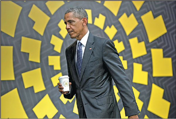 Us President Barack Obama Leaves A News Conference During