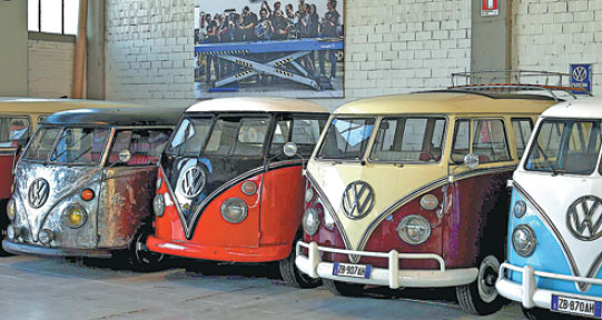 Restored Volkswagen campers at the garage in Florence, Italy. Alberto