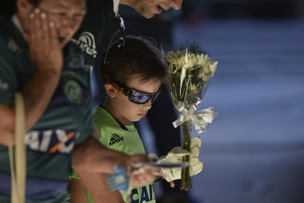 People Pay Tribute To The Brazilian Soccer Players In Santa Catarina Brazil On Thursday The