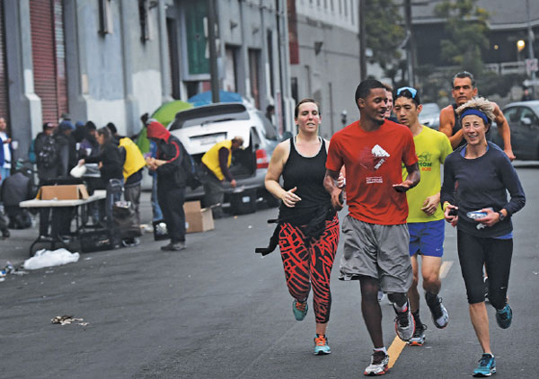 Members Of The Midnight Runners Club Take Part In A 10