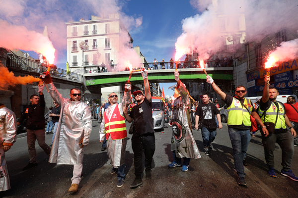 French PM shrugs off labor protests