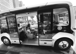visitors try a self driving bus at a high tech zone in zhengzhou henan