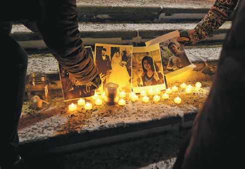 people attend a candlelight vigil held on wednesday in edmonton canada