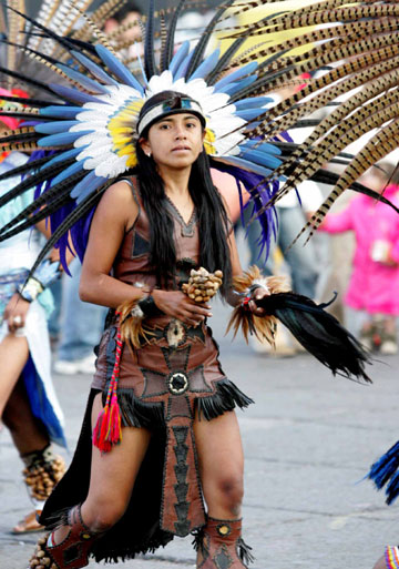 A girl performs an Indian dance in Mexico City to celebrate Christmas, December 23, 2006.