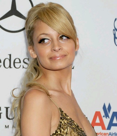 McPhee and other celebs attend Carousel of Hope Ball
