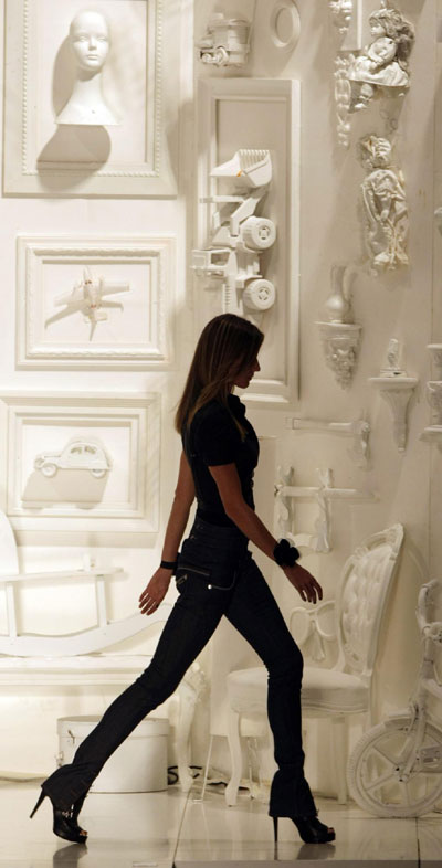 Gisele Bundchen displays creation part of during Sao Paulo Fashion Week