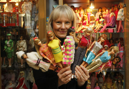 Owner shows Barbie doll collection