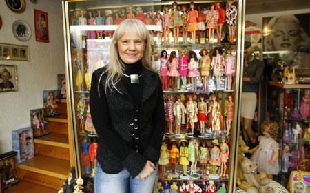 Owner shows Barbie doll collection