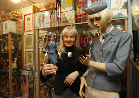 Owner shows Barbie doll collection