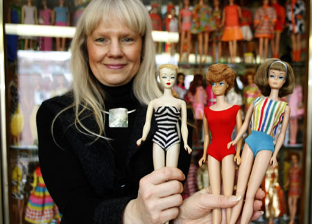 Owner shows Barbie doll collection
