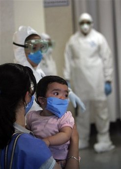 Swine flu may be less potent than first feared