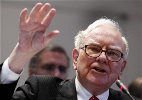 Buffett lunch draws $700,100 bid as pace quickens