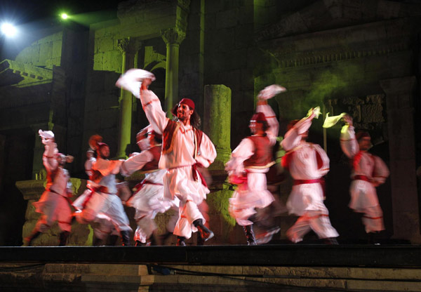 Syrian troupe Enana perform during the Jerash Festival in the ancient city of Jerash