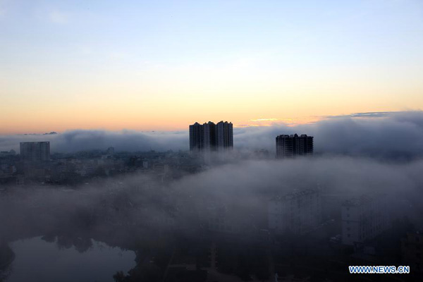 Cloud-blanketed Luoping county in SW China's Yunnan