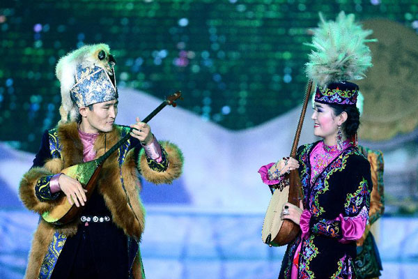 Actors perform Snowland Families in Xinjiang