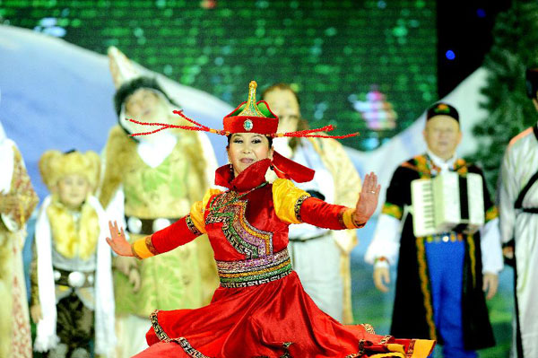 Actors perform Snowland Families in Xinjiang