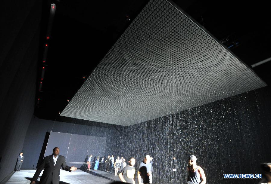 People experience 'Rain Room' art installation in New York