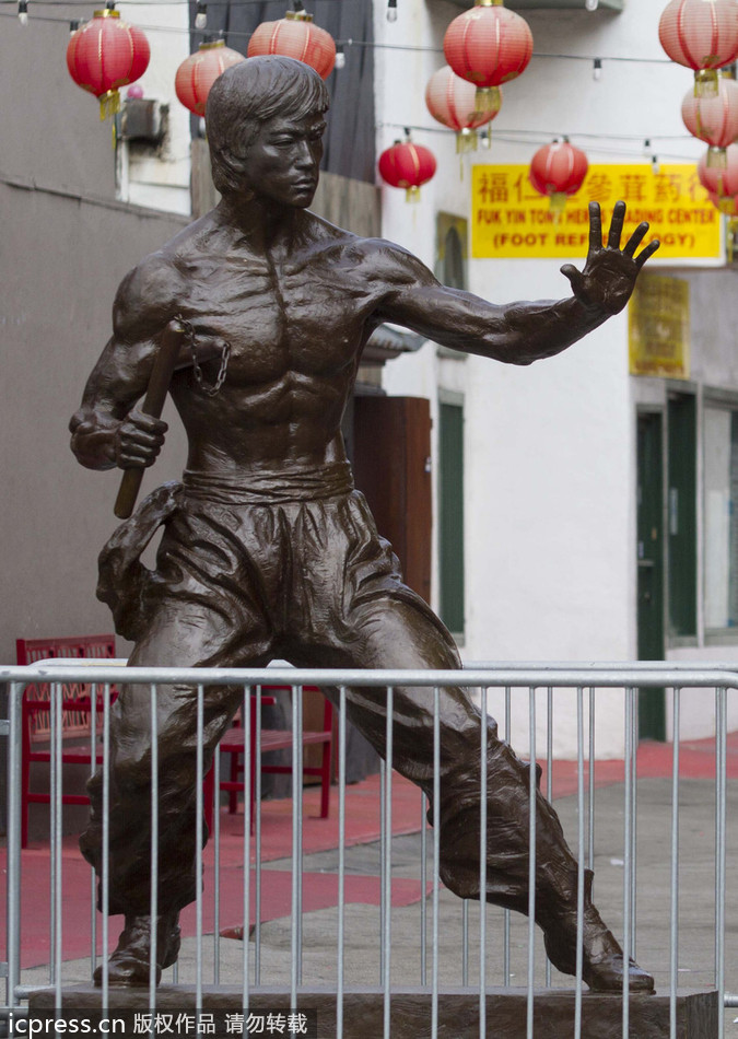 Bronze statue of kung fu star Bruce Lee on display in LA