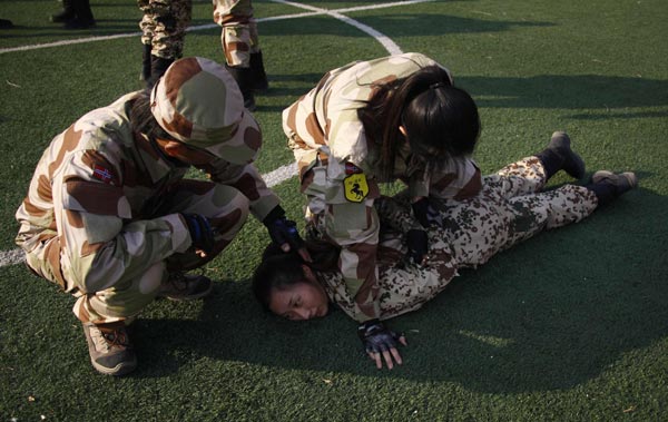 Female bodyguards keep threats at arm's length