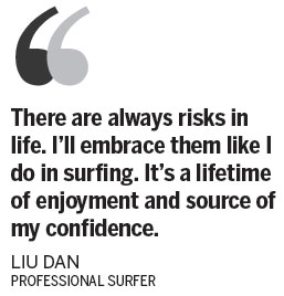 Female surfer rides China's waves