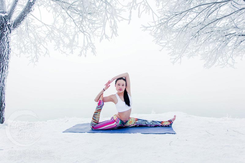 Woman does Yoga in minus 30 degrees deep freeze